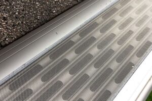 gutter guards reduce clogs and maintenance